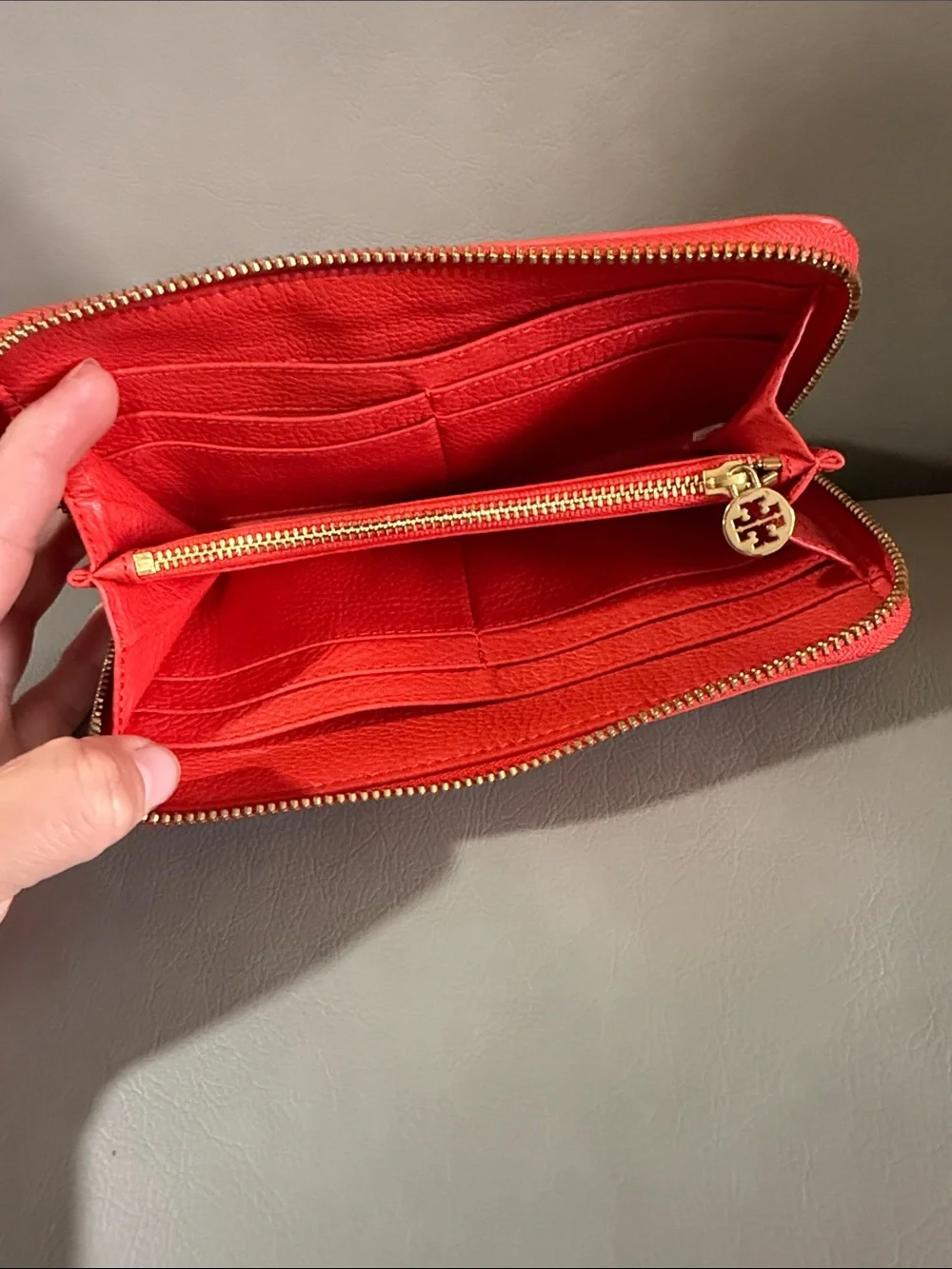Tory Burch orange Pebbled Leather Zip Wallet with Gold Logo